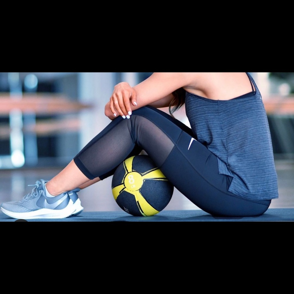 Nike black crop leggings with mesh detail